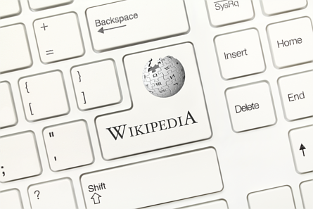 Wikipedia button on a computer keyboard in shape of the Enter key
